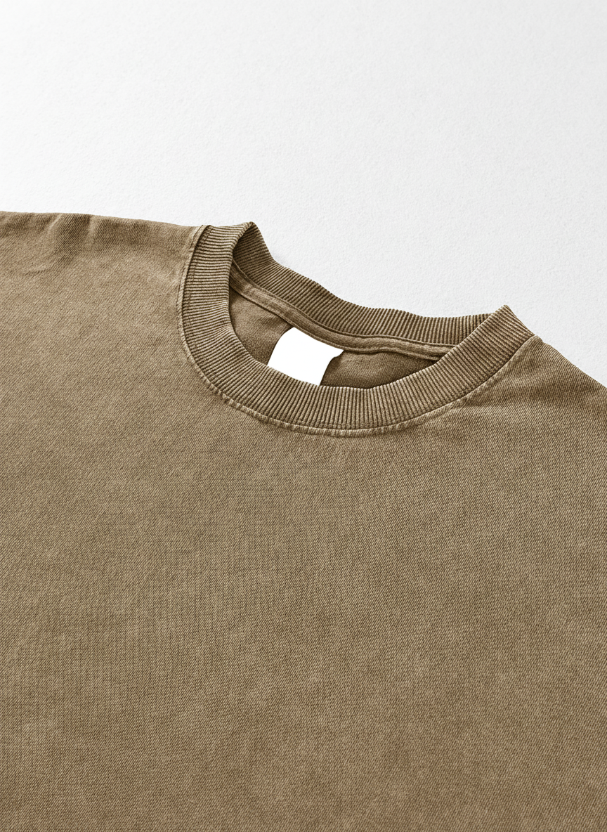 Close-up of a brown sweatshirt collar on a white background