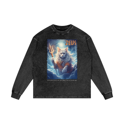 A black long-sleeved t-shirt with a graphic design depicting a cat holding a lightning bolt and the text "Zeus" above it.