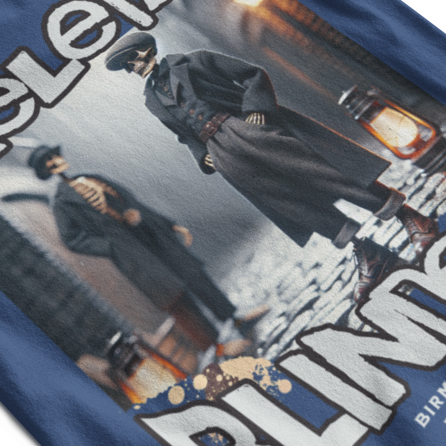 Blue t-shirt with graphic design of a person in a suit and text 'Meleers' on a white background