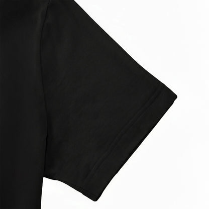 A close-up view of a black t-shirt sleeve.
