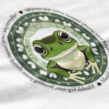 Frog design on a white shirt with text and patterns
