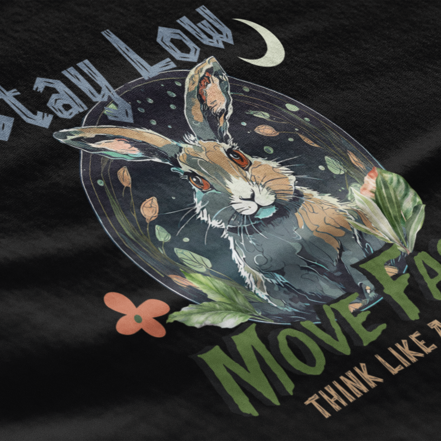 T-shirt with a hare design and text 'Stay Low, Move Fast, Think Like a Hare' on a black background