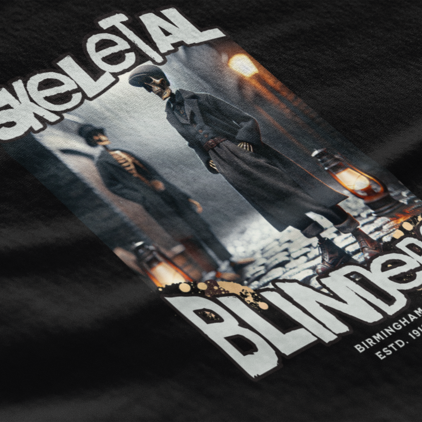 Black t-shirt with 'skeletal' and 'Blinders' design on a dark background