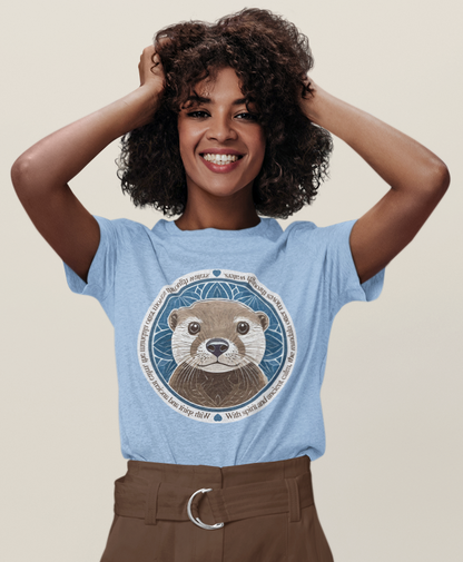 Woman wearing a blue t-shirt with a graphic design on a beige background