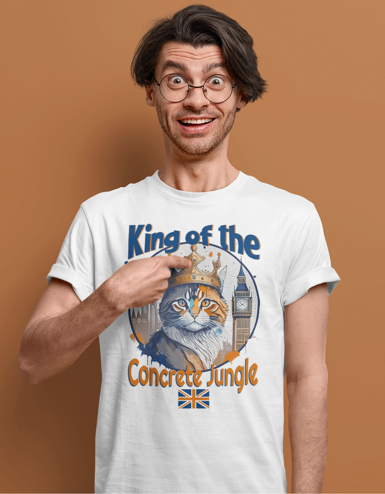 Man wearing a white t-shirt with a cat graphic and text on a brown background